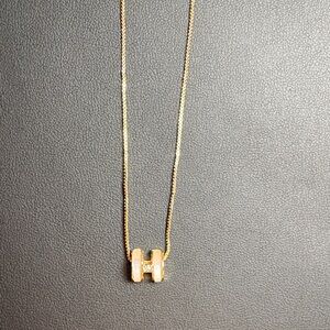 Mother of Pearl Gold Necklace with small
initial H Pendant